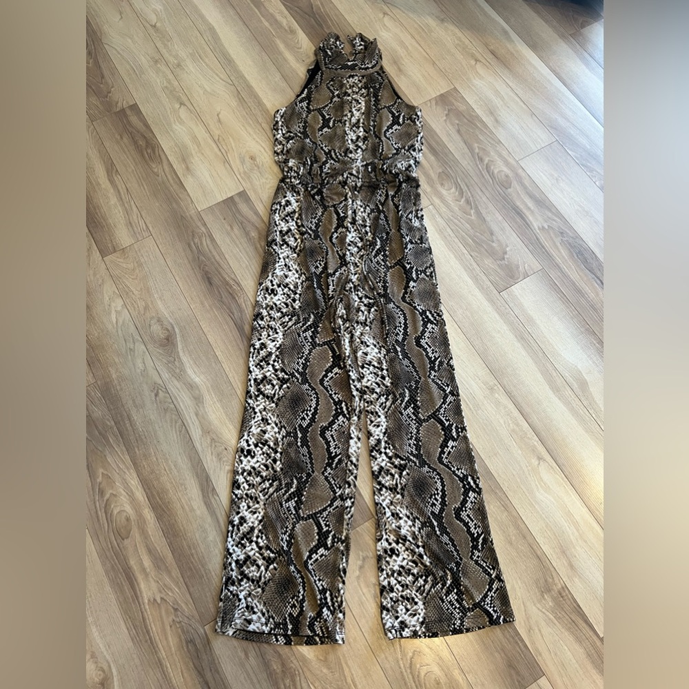 Snakeskin Jumpsuit from Kate and Lily. Size 8